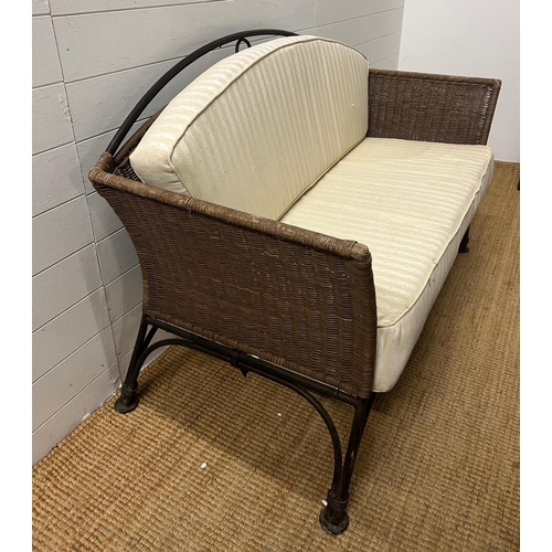 204 - A metal rattan rustic garden suite comprising of a two seater sofa, his and her chairs, footstool an... 