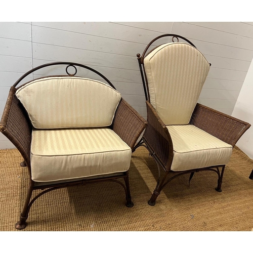 204 - A metal rattan rustic garden suite comprising of a two seater sofa, his and her chairs, footstool an... 