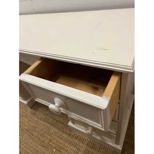 22 - A pine dressing table/desk painted white (H76cm W130cm D46cm)