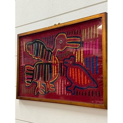 246 - An Arts and crafts needle work of birds framed 36.5cm x 23.5cm