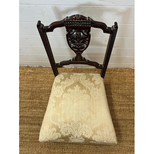 28 - A Victorian trophy pieced back nursing chair (H77cm)