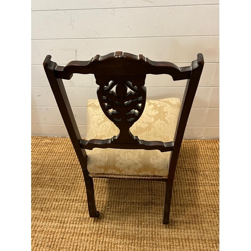 28 - A Victorian trophy pieced back nursing chair (H77cm)