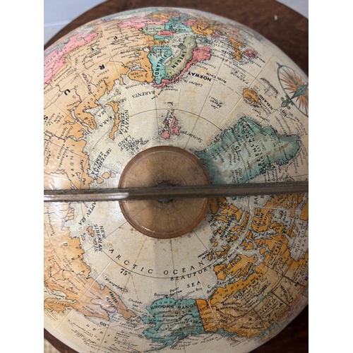 29 - A desk top globe by Replogle globes made is USA on a mahogany stand