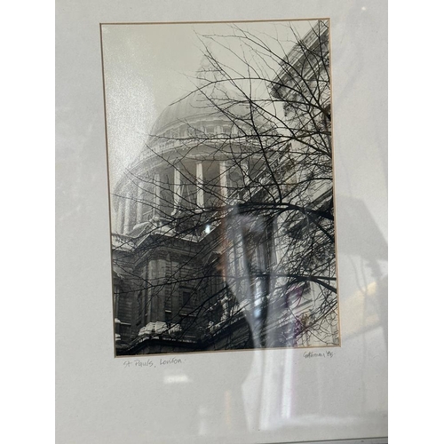 302 - Two black and white framed photographs of London, Tower Bridge and St Pauls both signed lower right ... 