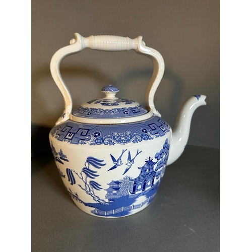 311 - Two blue and white chinese style ceramics. A tea pot and a chamber pot