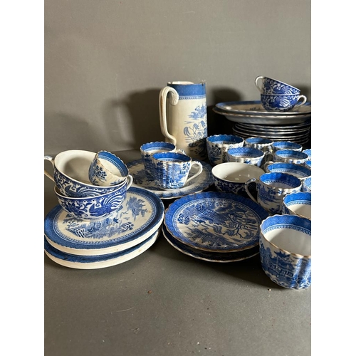 312 - A substantial amount of blue and white china dinner service