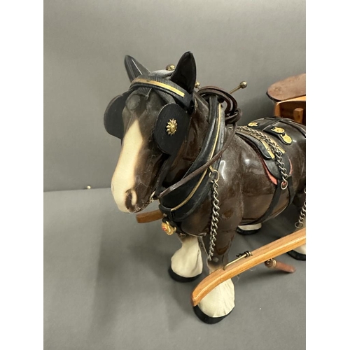 316 - A ceramic horse and cart