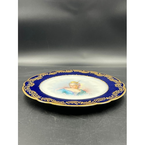 317 - An 18th Century Sèvres hand-painted and parcel-gilt cobalt porcelain portrait plate of the Duchess d... 