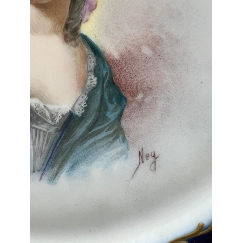 317 - An 18th Century Sèvres hand-painted and parcel-gilt cobalt porcelain portrait plate of the Duchess d... 