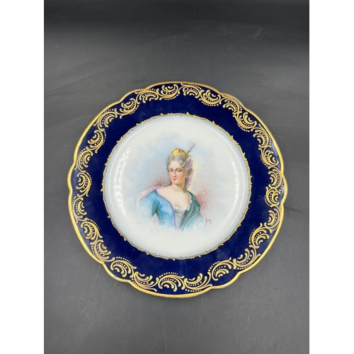 317 - An 18th Century Sèvres hand-painted and parcel-gilt cobalt porcelain portrait plate of the Duchess d... 