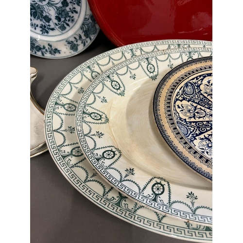 321 - A selection of china serving dishes, platters and cake stand, various makers and sizes