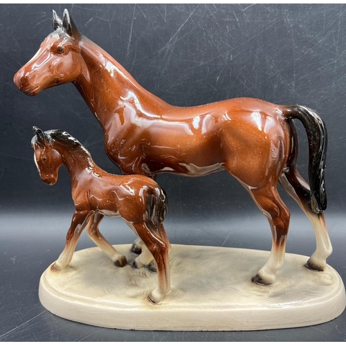 326 - A collection of china animals including metal prancing horses and Beswick style horses