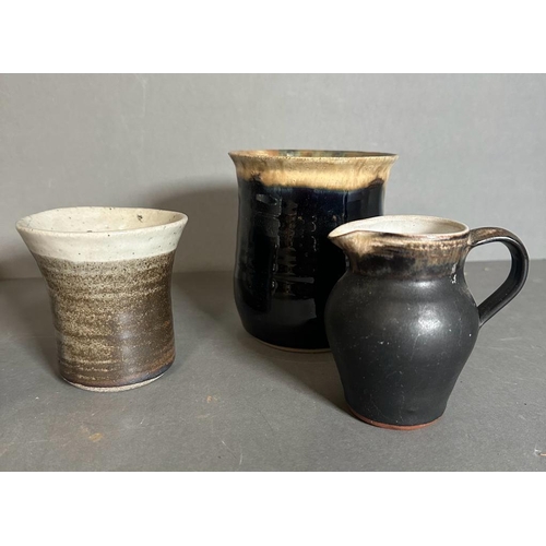 335 - Five Studio pottery items, jugs, a vase and a beaker