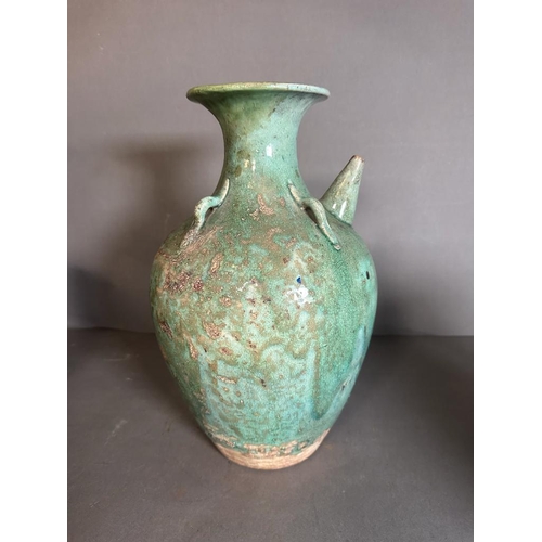 336 - A Studio pottery green ground jug and a blue ground vase