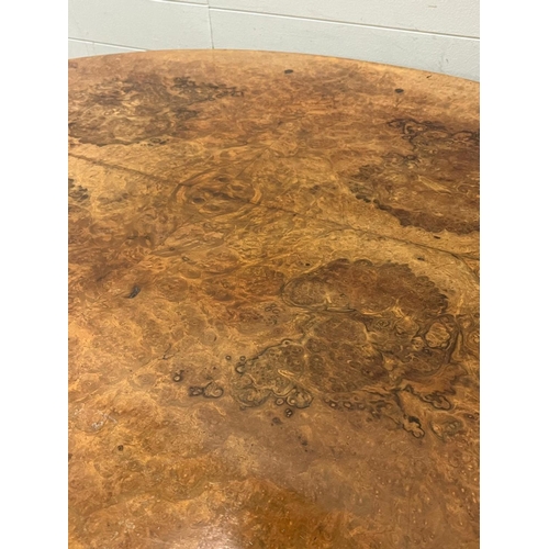 36 - A burr walnut loo table (H70cm W146cm D110cm)