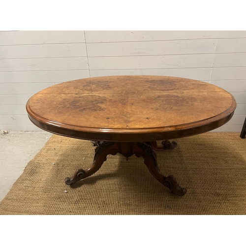 36 - A burr walnut loo table (H70cm W146cm D110cm)