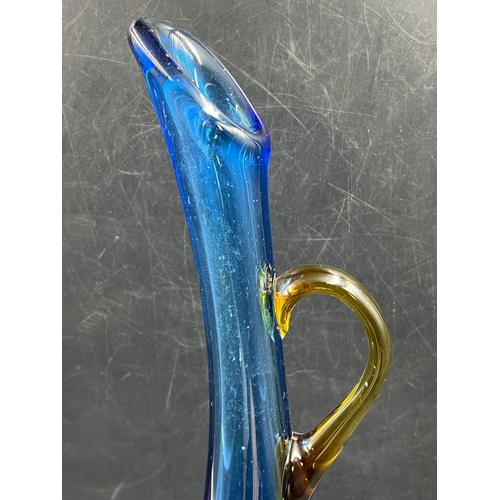 360 - A cobalt blue Art glass jug with pulled base and amber handle (H43cm)