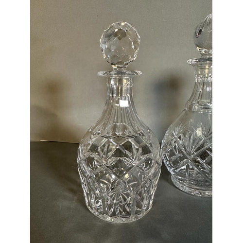 380 - Three cut glass decanters