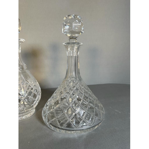 380 - Three cut glass decanters