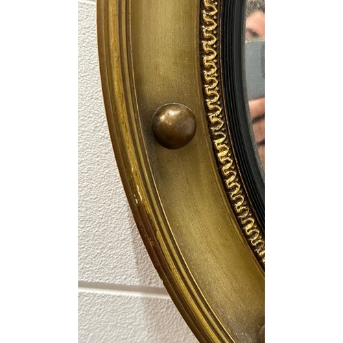 387 - A regency style gilt mirror