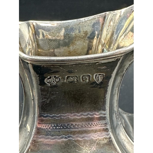 407 - A silver milk jug and sugar bowl hallmarked for London 1894 by William Hutton & Sons Ltd approximate... 