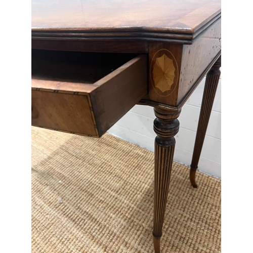 43 - A Regency style mahogany side table on tapering out swept legs (H74cm W82cm D47cm)