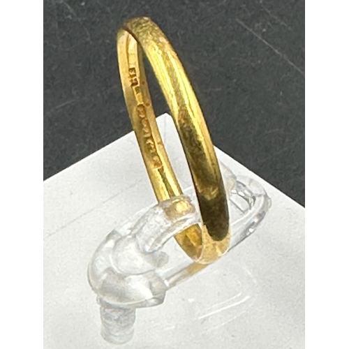 434 - A 22ct gold wedding band (Approximate Total weight 3.2g)