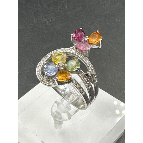 442 - A 14ct white gold cocktail ring with diamonds and semi precious stones (Approximate Total Weight 8g)