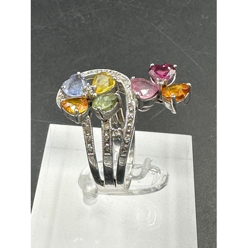 442 - A 14ct white gold cocktail ring with diamonds and semi precious stones (Approximate Total Weight 8g)