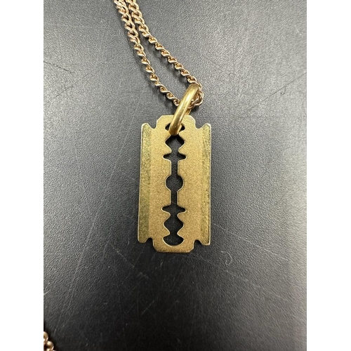 448 - An 18ct gold razor blade pendant on a 9ct gold necklace (1.7ct and 4.3ct)