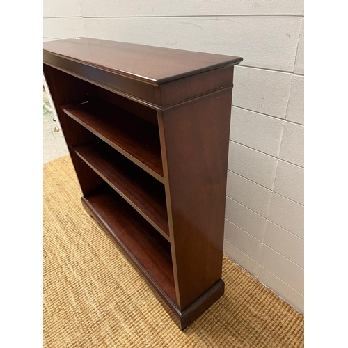 45 - A reproduction mahogany open bookcase (95cm X 24cm)