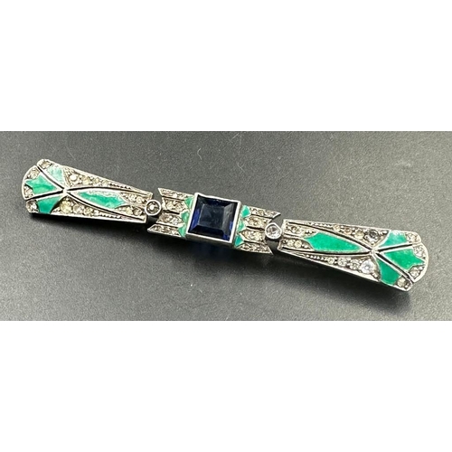 455 - An Art Deco brooch with central blue stone