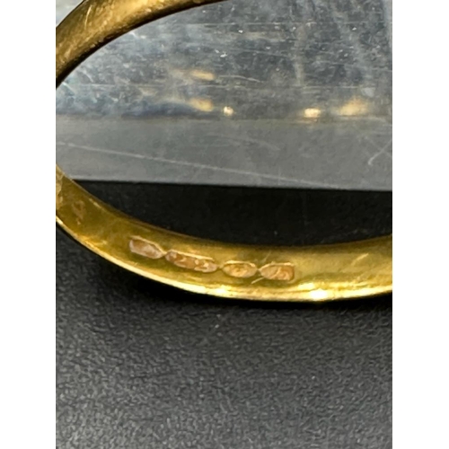 459 - A 22ct gold wedding band (Approximate total weight 2.1g) Size R