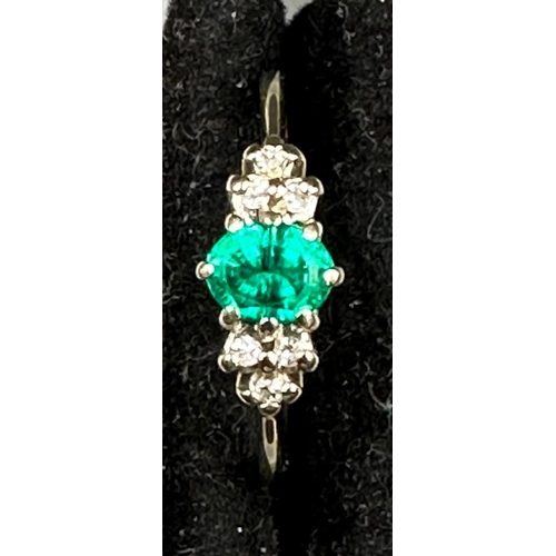 471 - A 9ct gold ring with emerald and diamonds size M