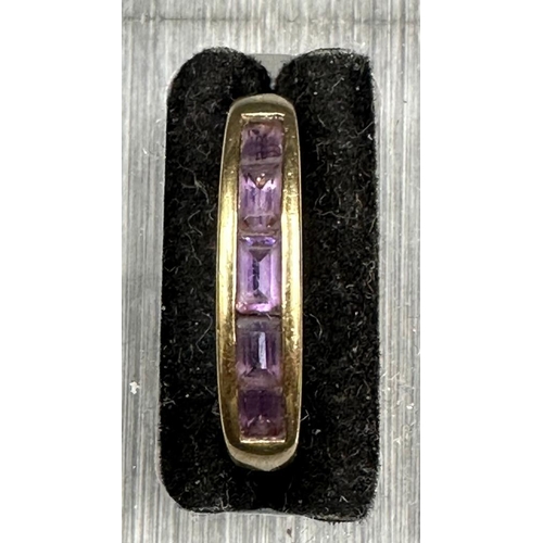 473 - A 9ct gold and amethyst ring. Size R