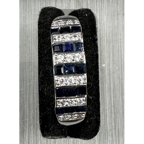 474 - A 9ct gold sapphire and CZ ring, size T 1/2