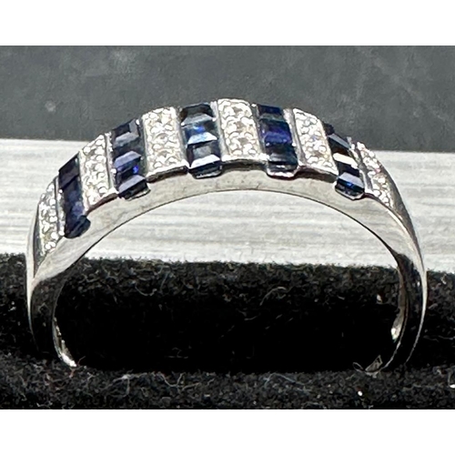 474 - A 9ct gold sapphire and CZ ring, size T 1/2