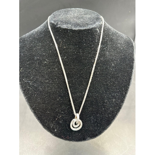 489 - An 18ct white gold diamond pendant on 18ct white necklace