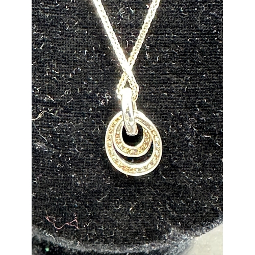 489 - An 18ct white gold diamond pendant on 18ct white necklace