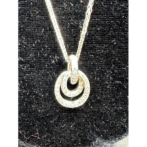 489 - An 18ct white gold diamond pendant on 18ct white necklace