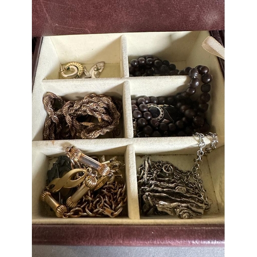 494 - A leather Jewellery box containing a wide range of quality costume jewellery