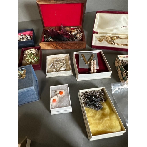 498 - A large selection of boxed costume jewellery, various styles and makers.