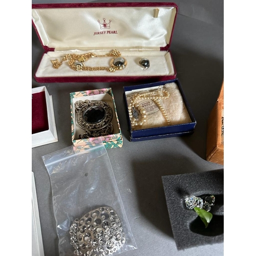 498 - A large selection of boxed costume jewellery, various styles and makers.