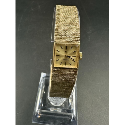 513 - Omega gold ladies wristwatch 9ct gold with 9ct gold bracelet.