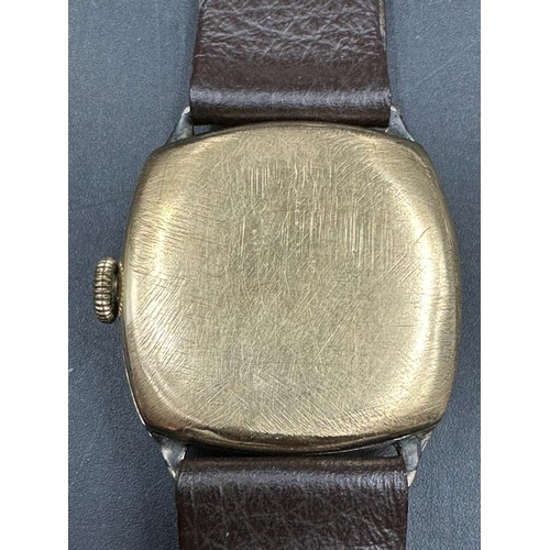 518 - A 9ct gold Vertex Revue wristwatch on leather strap