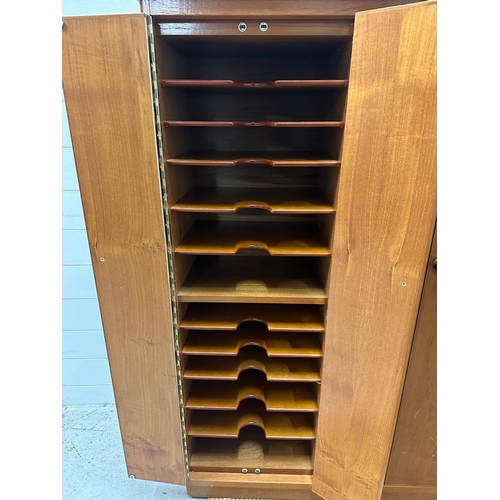 52 - A Mid Century teak Clerical cabinet comprising of three cupboards and multiple shelves (H128cm W118c... 