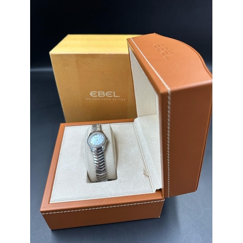 533 - A Ladies Ebel Diamond bezel watched, boxed with papers.