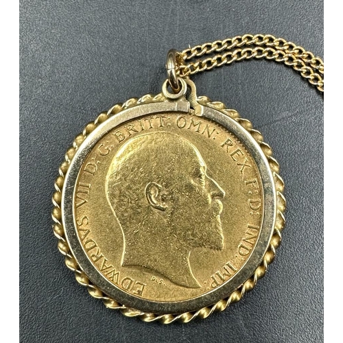 562 - A 1906 Half Sovereign on 9ct gold mount and chain. (Approximate Total Weight 7.1g)