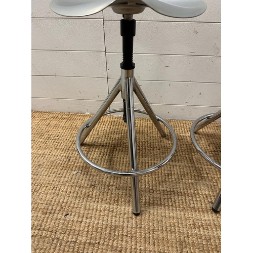 58 - A pair of industrial style adjustable swivel stools, chrome legs and moulded steel saddle seats