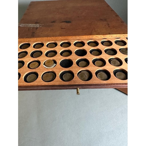 581 - A coin collectors cabinet containing a large selection of Great British coins along with worldwide c... 